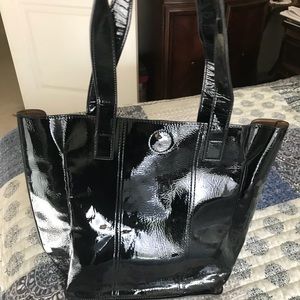 Black patent leather handbag